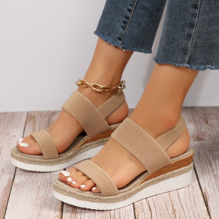 Orthopedic platform sandals featuring elastic straps, designed for comfort with a lightweight and breathable construction, perfect for all-day wear. 1