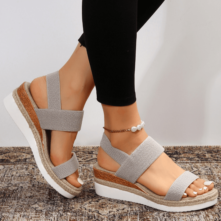 Orthopedic platform sandals featuring elastic straps, designed for comfort with a lightweight and breathable construction, perfect for all-day wear. 10