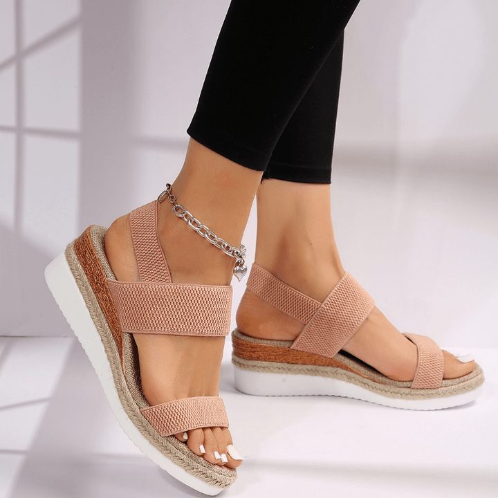 Orthopedic platform sandals featuring elastic straps, designed for comfort with a lightweight and breathable construction, perfect for all-day wear. 2