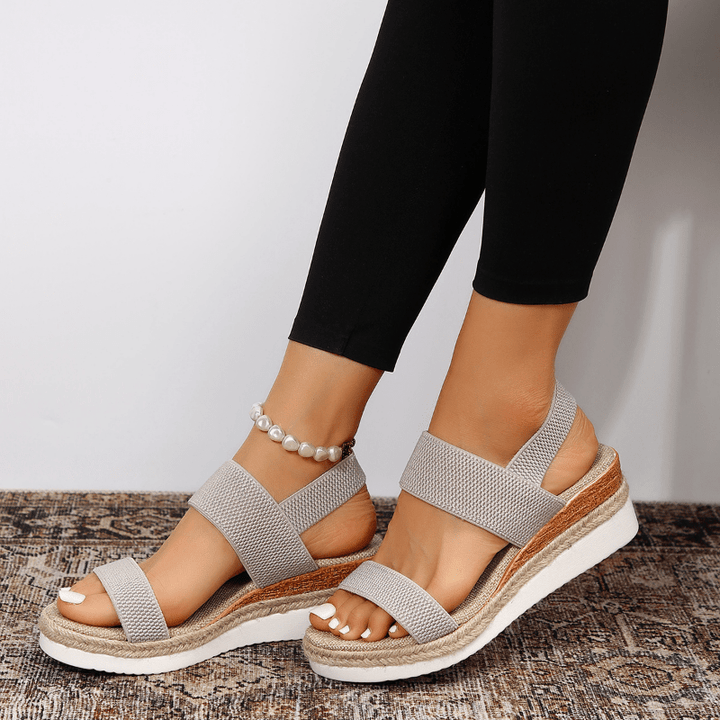 Orthopedic platform sandals featuring elastic straps, designed for comfort with a lightweight and breathable construction, perfect for all-day wear. 8