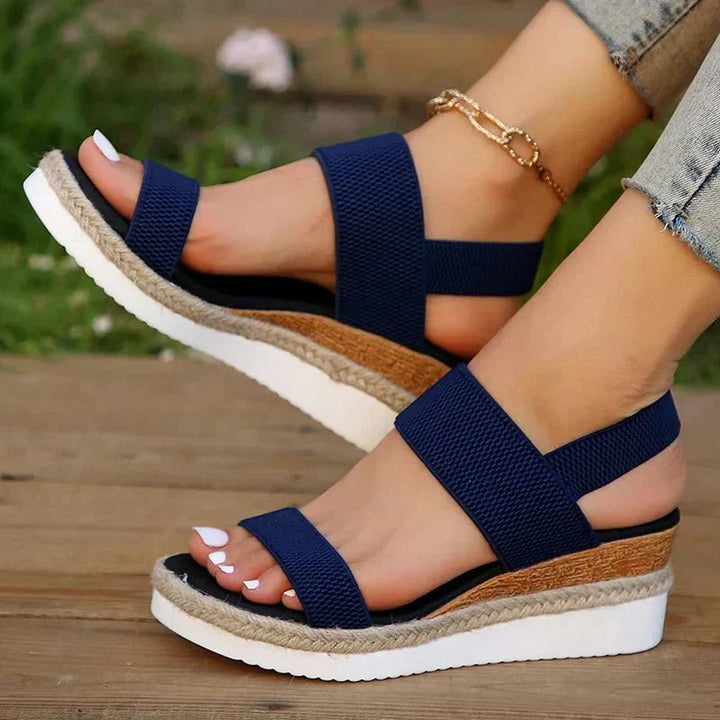 Orthopedic platform sandals featuring elastic straps, designed for comfort with a lightweight and breathable construction, perfect for all-day wear. 9