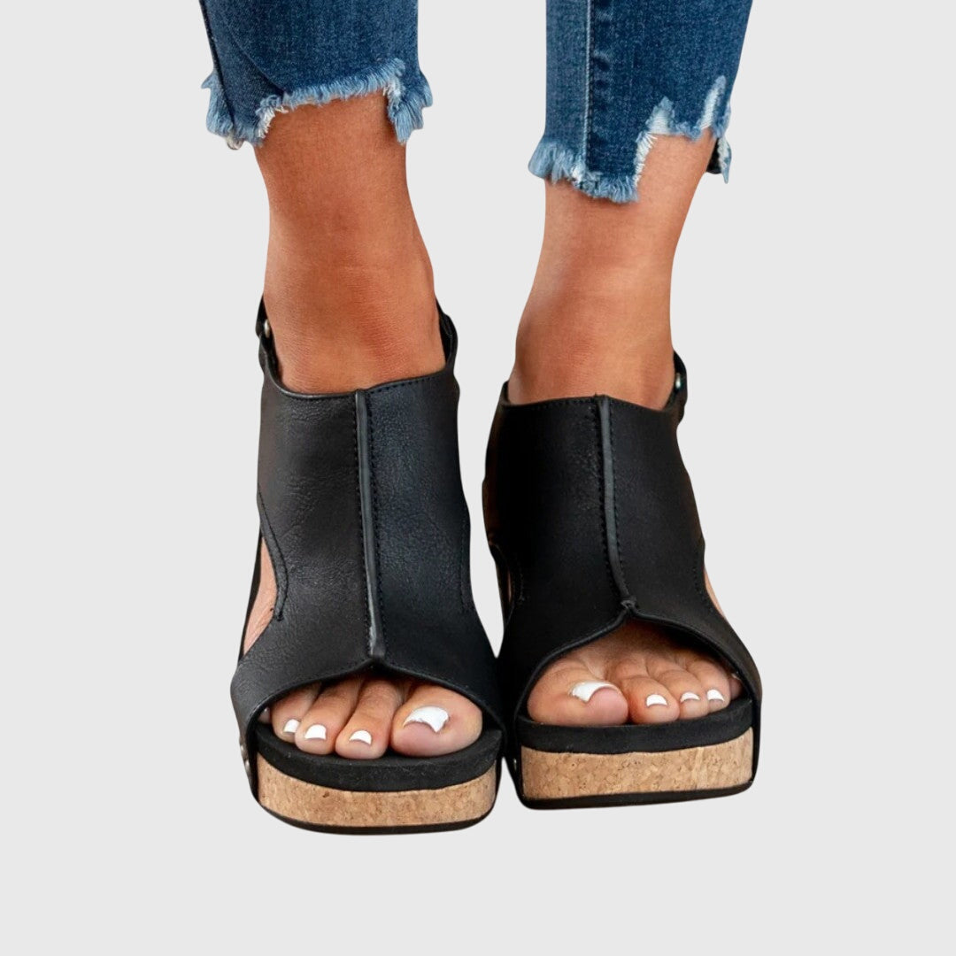 Orthopedic sandals featuring a cushioned insole, adjustable buckle, and lightweight wedge design, perfect for all-day comfort and support. 4