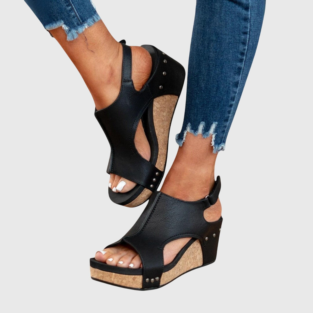 Orthopedic sandals featuring a cushioned insole, adjustable buckle, and lightweight wedge design, perfect for all-day comfort and support. 6