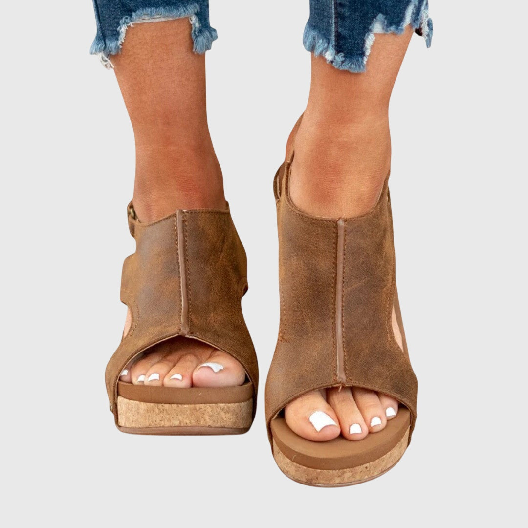 Orthopedic sandals featuring a cushioned insole, adjustable buckle, and lightweight wedge design, perfect for all-day comfort and support. 8