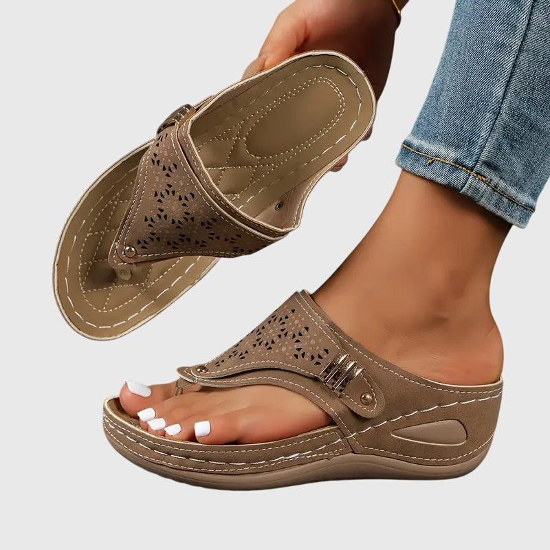 Orthopedic sandals featuring ergonomic support, a shock-absorbing sole, and a convenient slip-on design for ultimate comfort and foot health. 1