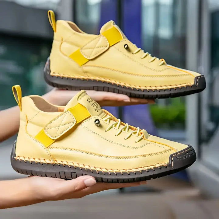 Orthopedic sneakers featuring a shock-absorbing EVA sole, breathable leather upper, wide fit, and slip-on design for ultimate comfort and support. 2