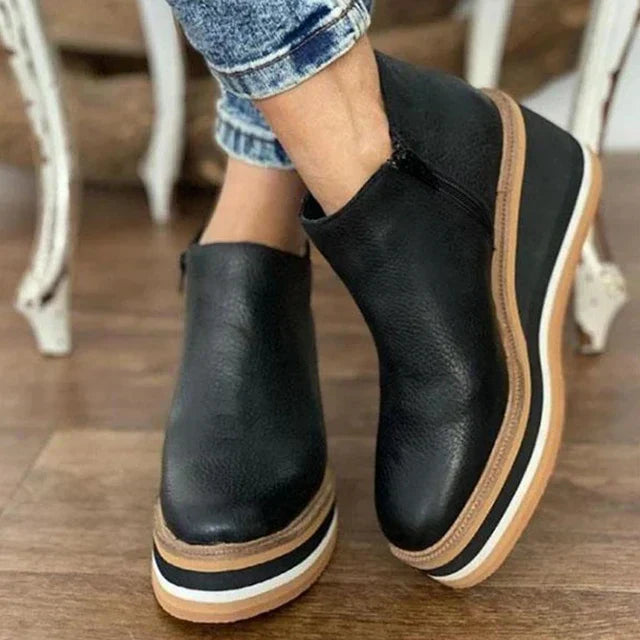 Orthopedic waterproof boots featuring an easy side zipper and a sleek design, perfect for all-weather comfort and support. 1