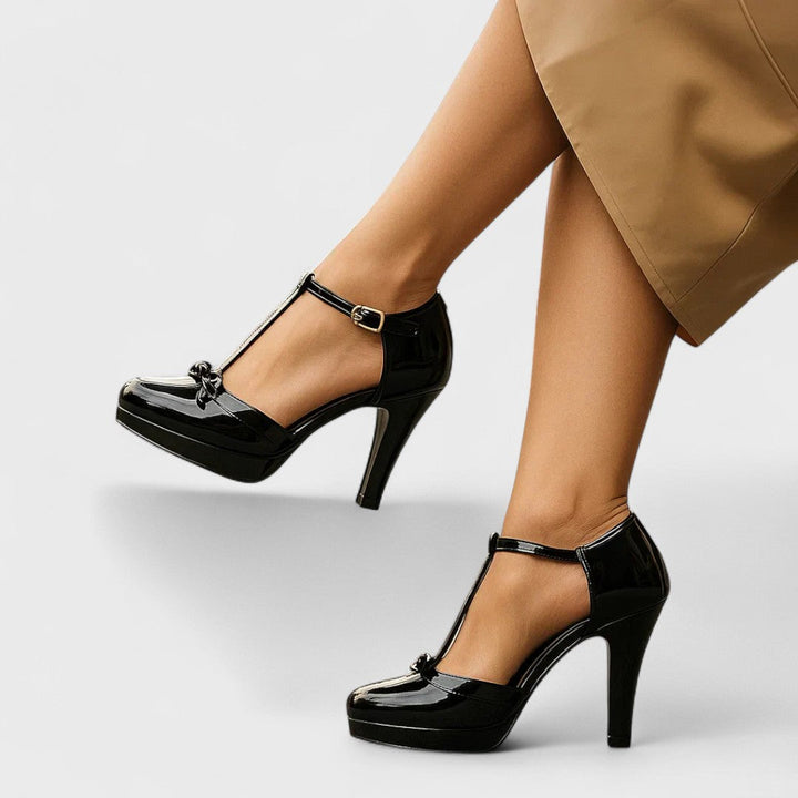Orthopedic women's heels in black leather featuring a padded insole and solid heel for modern elegance and comfort. 6