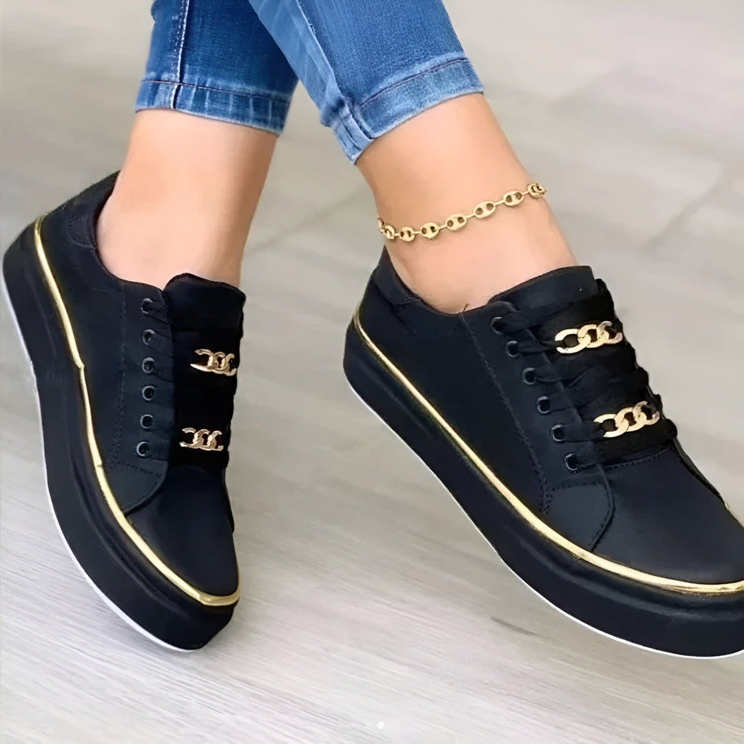 Orthopedic women's sneakers featuring shock-absorbing soles and stylish golden accents, perfect for comfort and fashion. 2