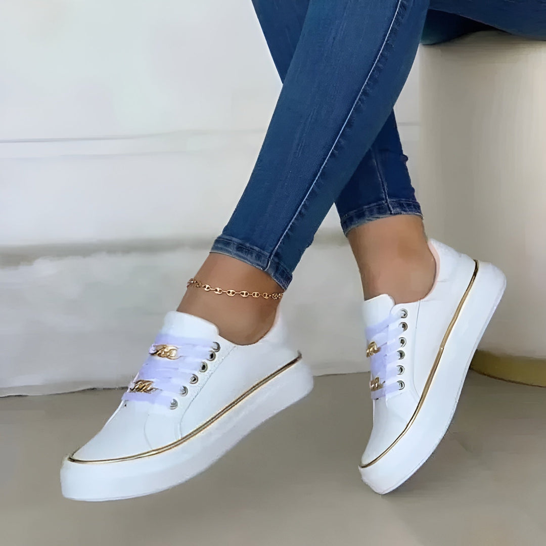 Orthopedic women's sneakers featuring shock-absorbing soles and stylish golden accents, perfect for comfort and fashionable everyday wear. 3