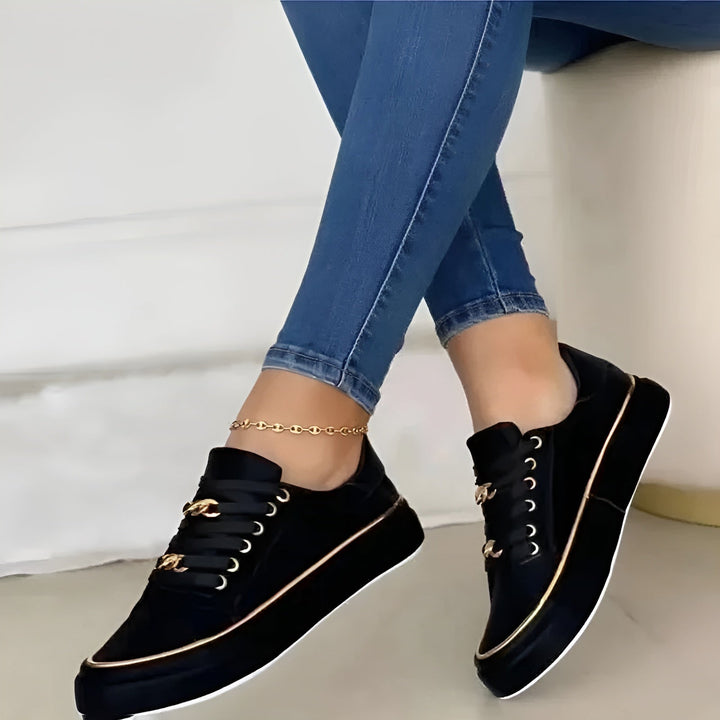 Orthopedic women's sneakers featuring shock-absorbing soles and stylish golden accents, perfect for comfort and fashion. 5
