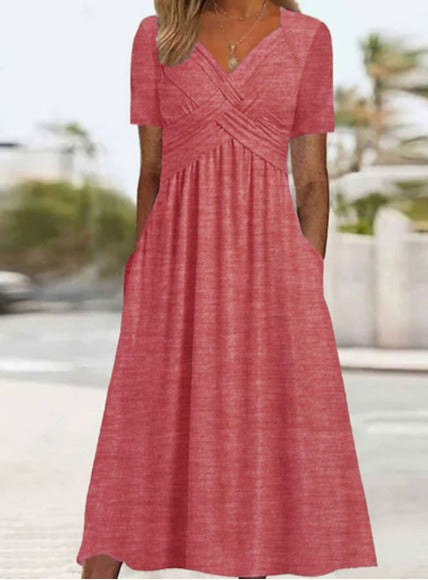 Elegant Midi Dress with Flattering Fit and Practical Side Pockets