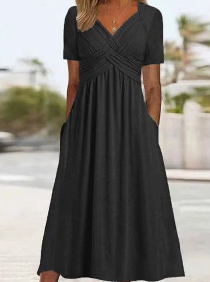 Elegant Midi Dress with Flattering Fit and Practical Side Pockets