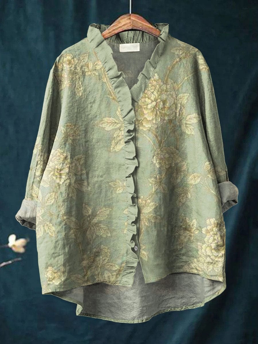 Women's blouse featuring a ruffle neckline and vintage floral print, crafted from a soft linen-cotton blend for comfort and style. 0