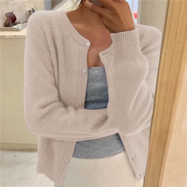 Women's cropped cardigan in black with button front, featuring a soft knit texture and relaxed fit, perfect for casual layering. 2