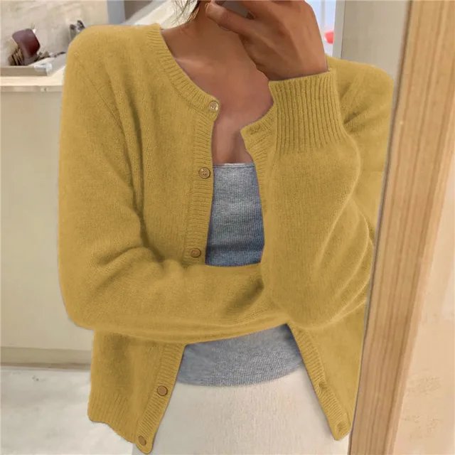 Women's cropped cardigan in black with button front, featuring a soft knit texture and relaxed fit, perfect for casual layering. 5