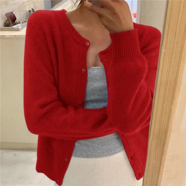 Women's cropped cardigan in black with button front, featuring a soft knit texture and relaxed fit, perfect for casual layering. 7