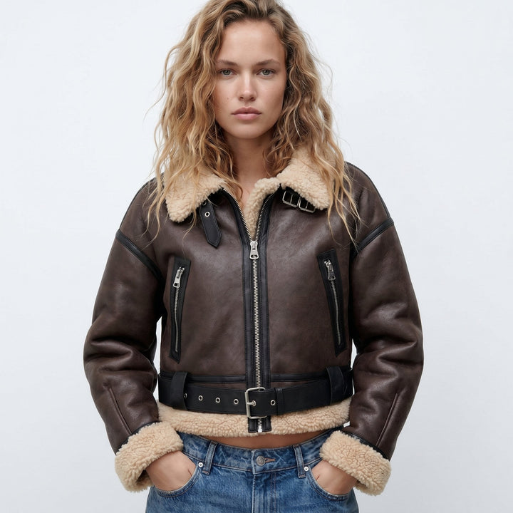 Women's double-sided shearling bomber jacket featuring a thick lining, perfect for versatile winter styling and protection against cold weather. 0