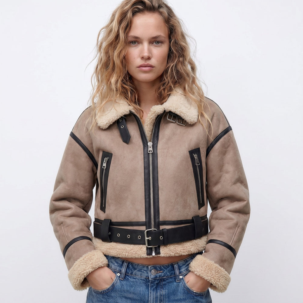 Women's double-sided shearling bomber jacket featuring a thick lining, perfect for versatile winter styling and protection against cold weather. 1