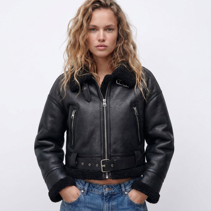 Women's double-sided shearling bomber jacket featuring a thick lining, perfect for versatile winter styling and protection against cold weather. 2
