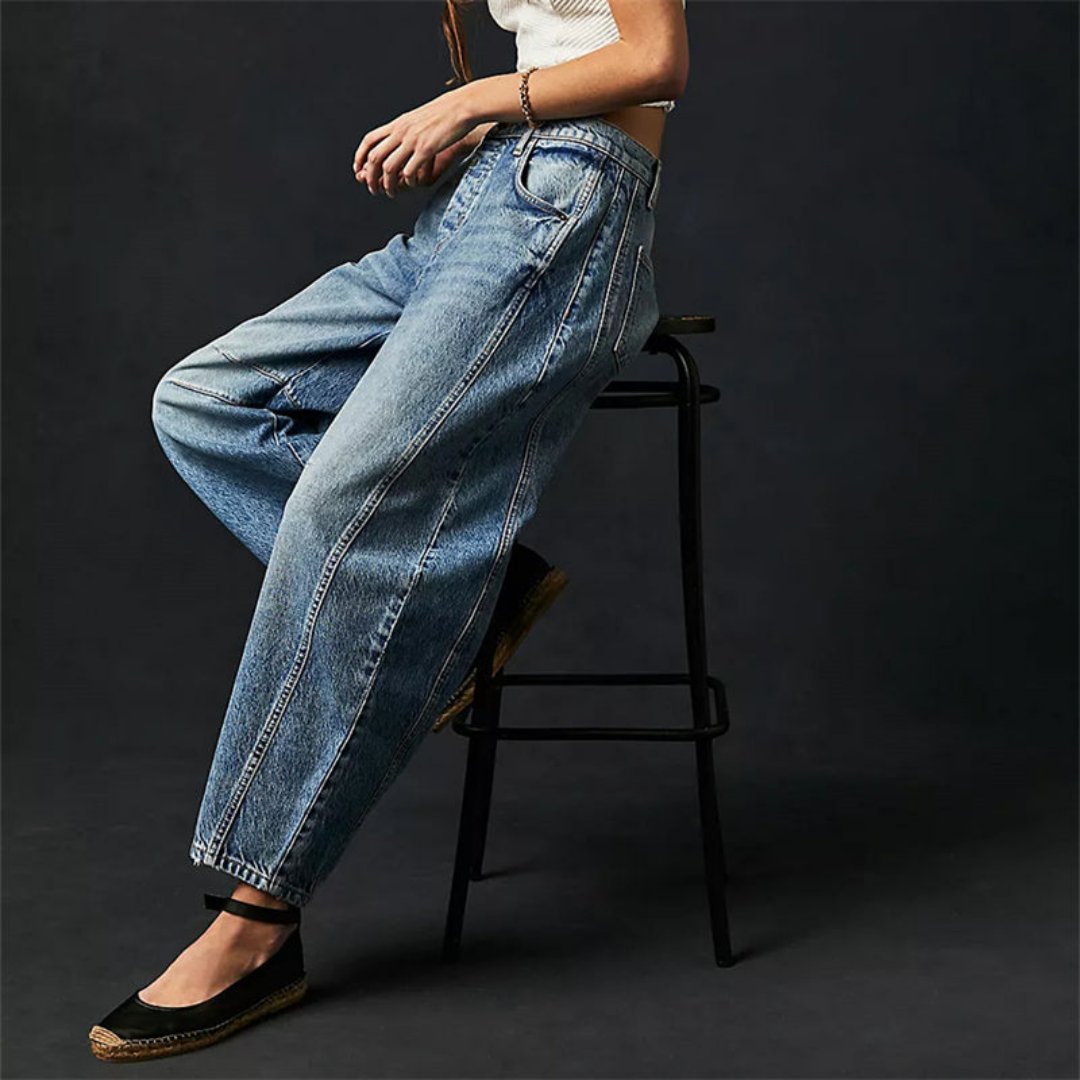 Women's mid-rise cropped barrel leg jeans in heavyweight denim featuring panel-stitched durability, styled in a medium-fade wash. 5