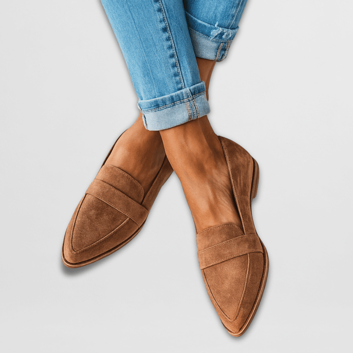 Women's loafers featuring cushioned support and a soft suede finish, available in elegant black or brown options for stylish comfort. 0