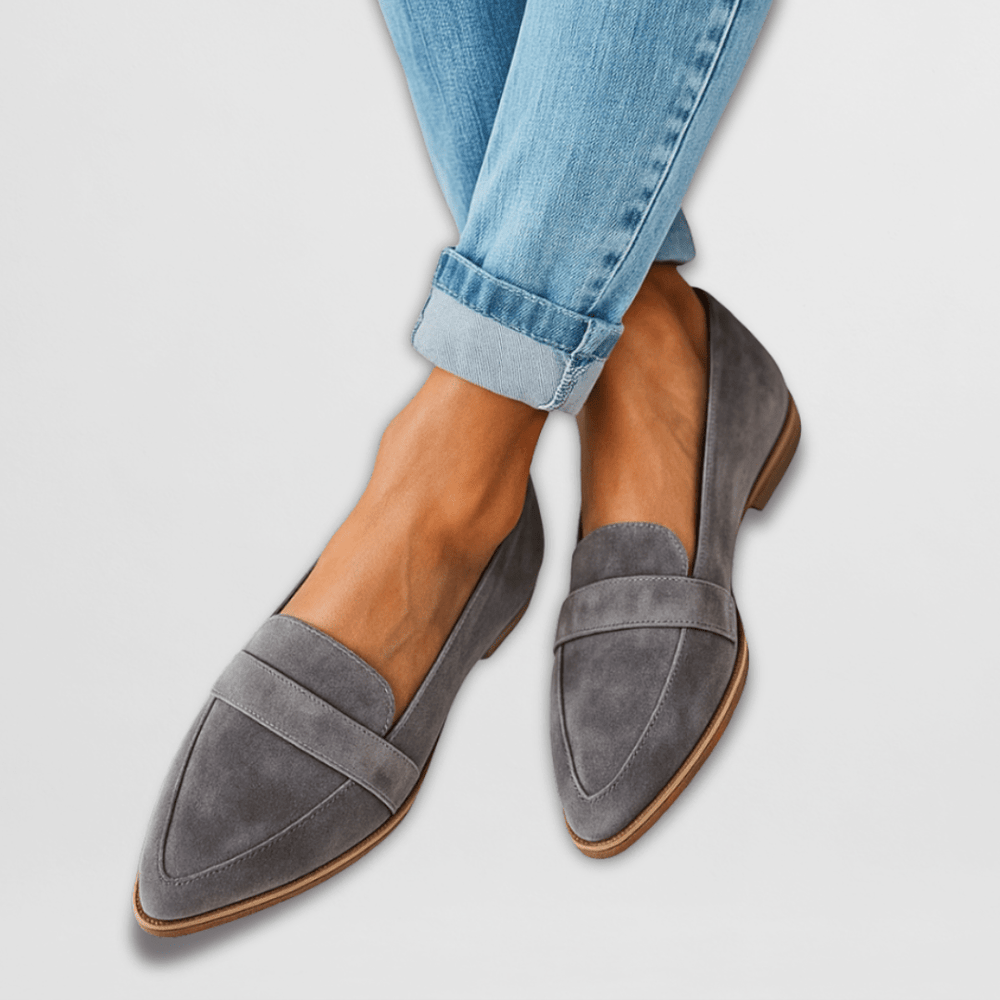 Women's loafers featuring cushioned support and a soft suede finish, available in elegant black or brown options for stylish comfort. 1