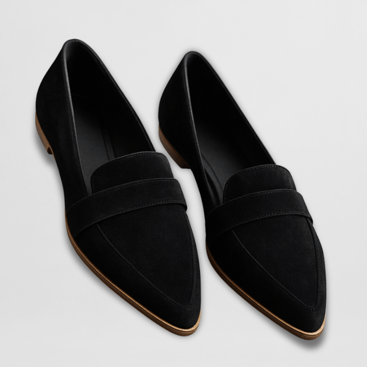 Women's loafers featuring cushioned support and a soft suede finish, available in elegant black or brown options for stylish comfort. 2