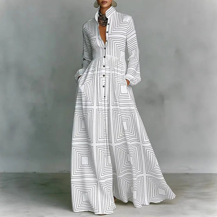 Women's maxi dress featuring a high-waist pleated design and geometric print, complete with long sleeves and a button-front for a stylish and comfortable look. 1