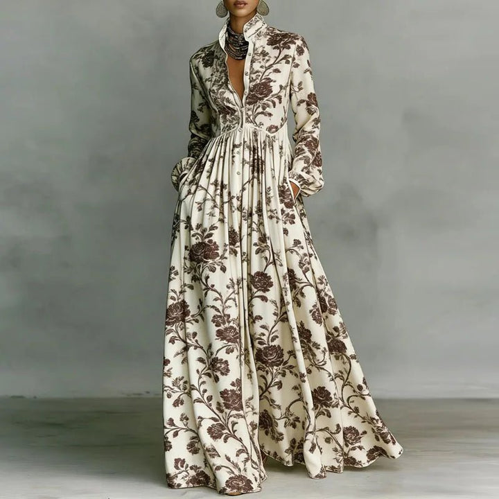 Women's maxi dress featuring a high-waist pleated design and geometric print, complete with long sleeves and a button-front for a stylish and comfortable look. 2