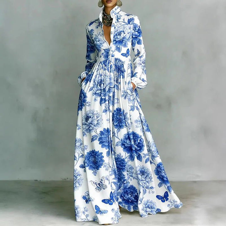 Women's maxi dress featuring a high-waist pleated design and geometric print, complete with long sleeves and a button-front for a stylish and comfortable look. 4