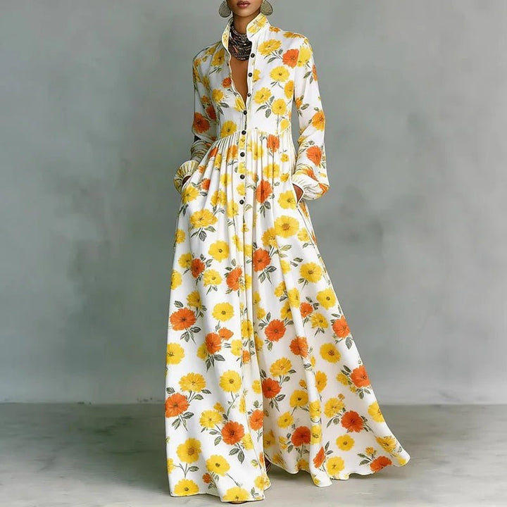 Women's maxi dress featuring a high-waist pleated design and geometric print, complete with long sleeves and a button-front for a stylish and comfortable look. 7