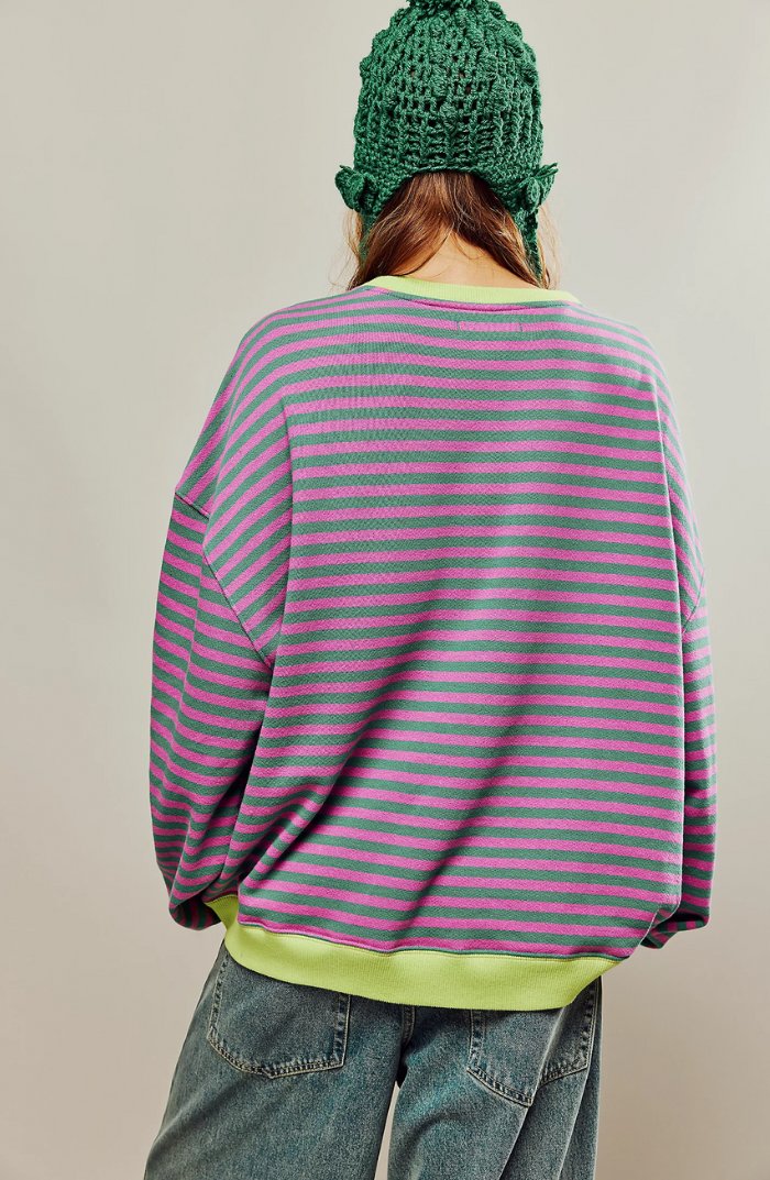 Women's oversized sweatshirt featuring a striped drop-shoulder design with neon contrast trim, made from lightweight knit fabric for comfortable, stylish wear. 1