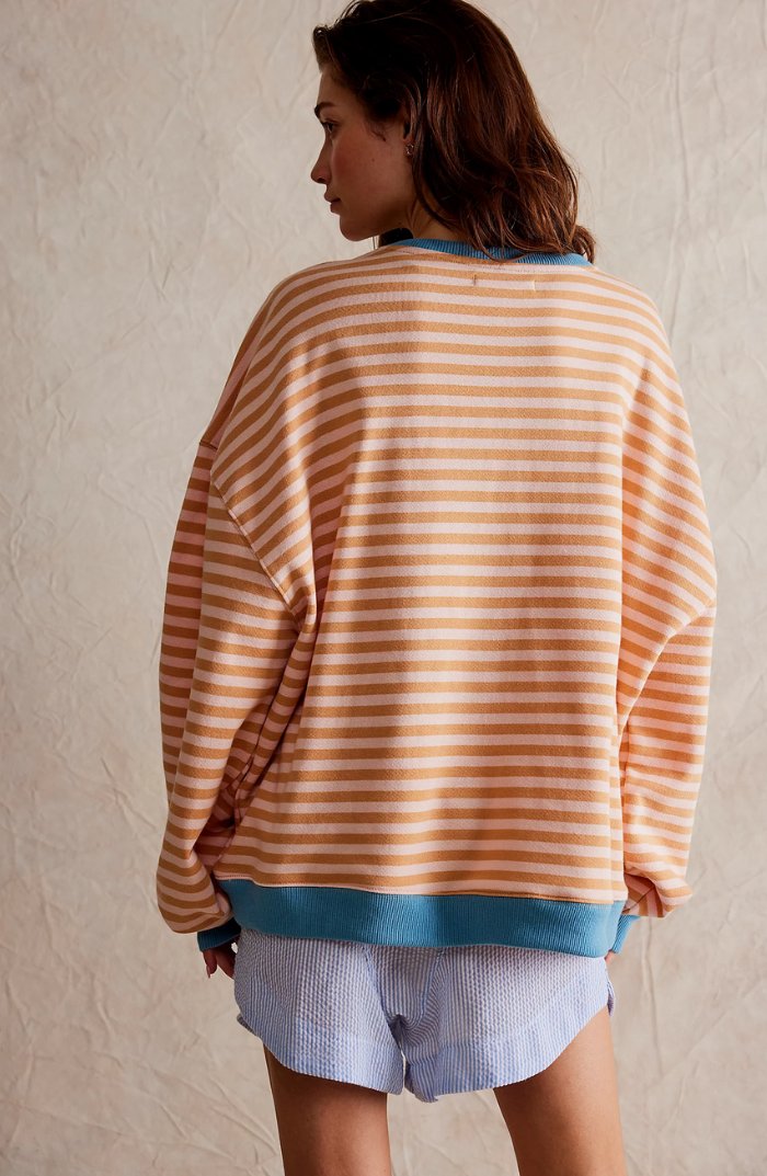 Women's oversized sweatshirt featuring a striped drop-shoulder design with neon contrast trim, made from lightweight knit fabric for comfortable, stylish wear. 7