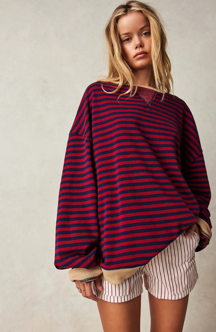 Women's oversized sweatshirt featuring a striped drop-shoulder design with neon contrast trim, made from lightweight knit fabric for comfortable, stylish wear. 8
