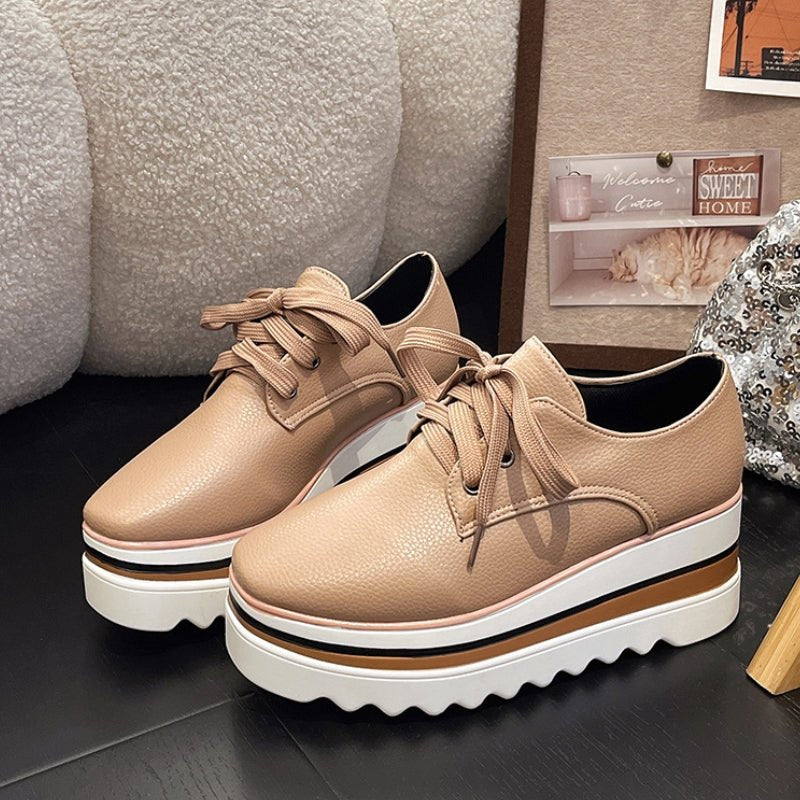 Beige striped women's platform oxford shoes featuring a lace-up closure and stylish wedge sole. 4