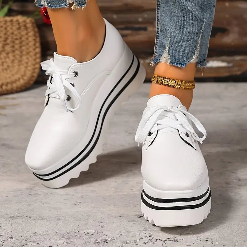 Beige striped women's platform oxford shoes featuring a lace-up closure and stylish wedge sole. 6