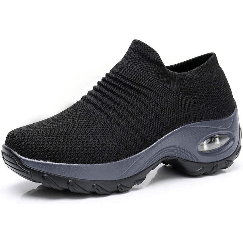 Women's slip-on sneakers featuring air cushion technology and a breathable knit design, perfect for all-day comfort and style. 0