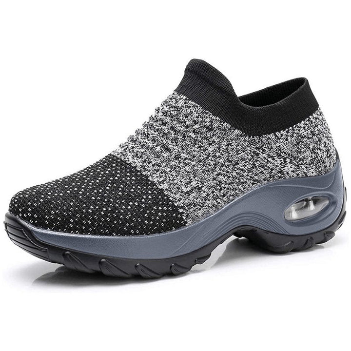 Women's slip-on sneakers featuring air cushion technology and a breathable knit design, perfect for all-day comfort and style. 1
