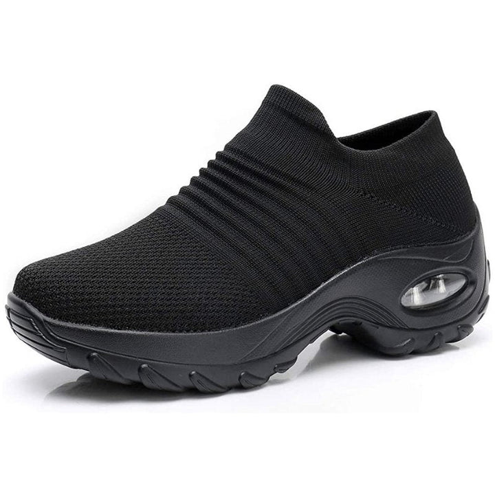 Women's slip-on sneakers featuring air cushion technology and a breathable knit design, perfect for all-day comfort and style. 2