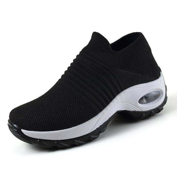 Women's slip-on sneakers featuring air cushion technology and a breathable knit design, perfect for all-day comfort and style. 3
