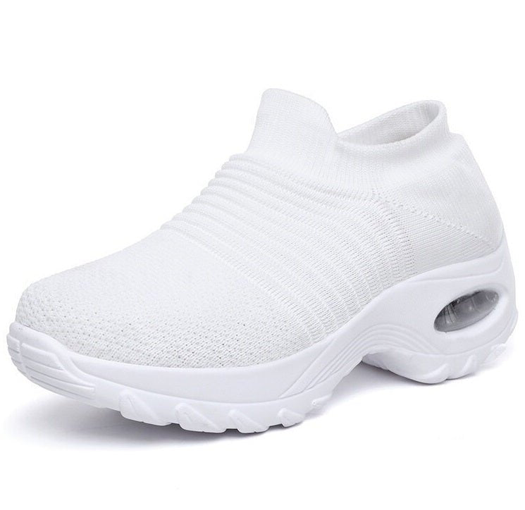 Women's slip-on sneakers featuring air cushion technology and a breathable knit design, perfect for all-day comfort and style. 4