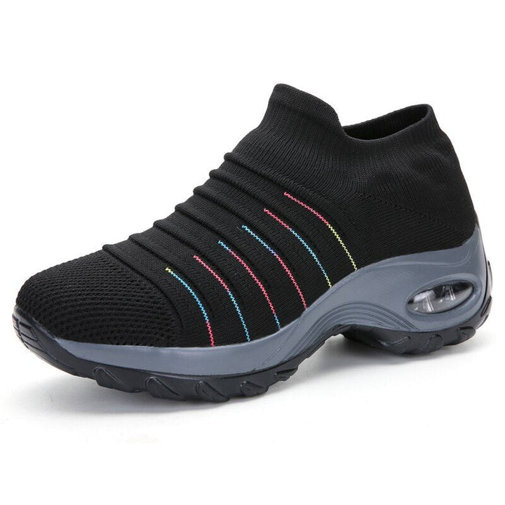 Women's slip-on sneakers featuring air cushion technology and a breathable knit design, perfect for all-day comfort and style. 7
