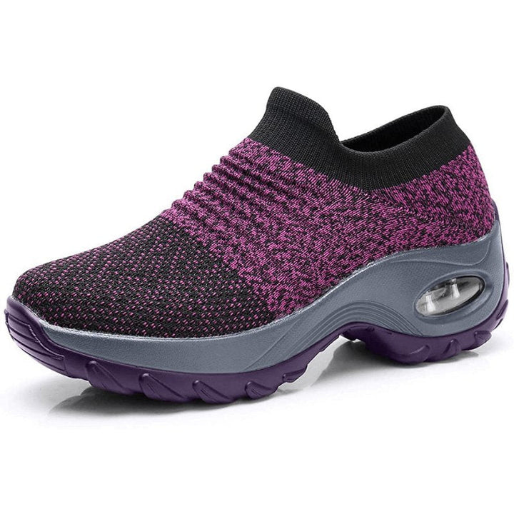 Women's slip-on sneakers featuring air cushion technology and a breathable knit design, perfect for all-day comfort and style. 8