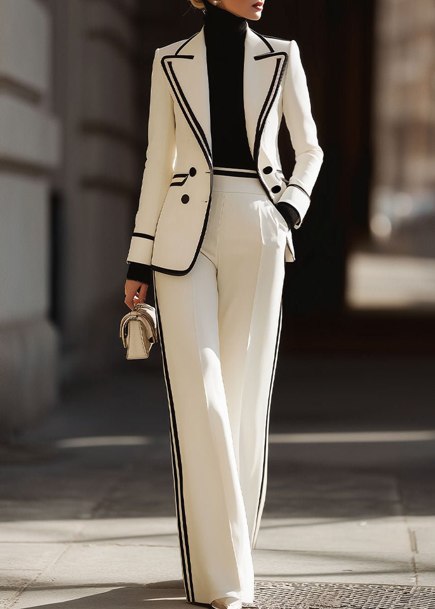 Women's suit set featuring a tailored double-breasted blazer and stylish wide-leg pants, perfect for structured professional attire in a modern workplace. 1