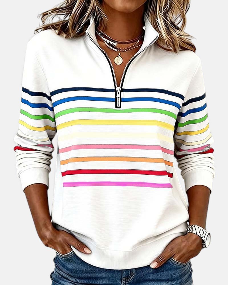 Women's relaxed fit cotton blend sweatshirt featuring a quarter zip design and vibrant rainbow stripes, perfect for casual outings and comfortable layering. 2