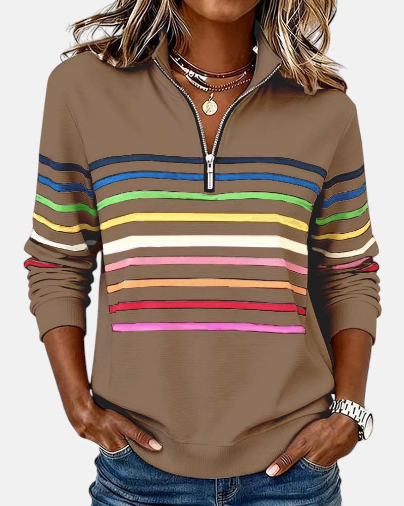 Women's relaxed fit cotton blend sweatshirt featuring a quarter zip design and vibrant rainbow stripes, perfect for casual outings and comfortable layering. 4