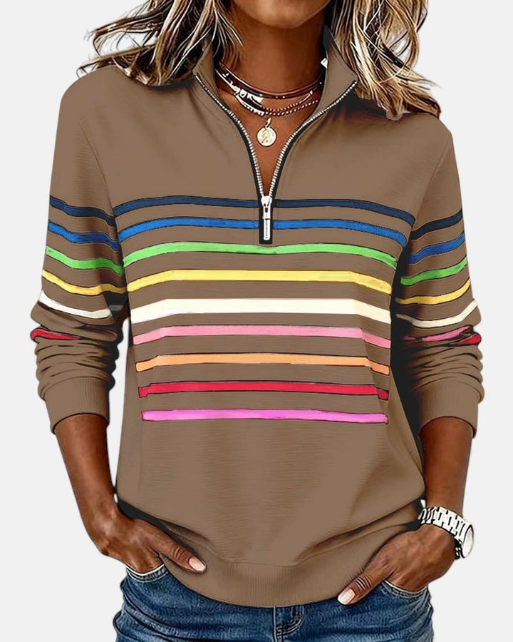 Women's relaxed fit cotton blend sweatshirt featuring a quarter zip design and vibrant rainbow stripes, perfect for casual outings and comfortable layering. 4