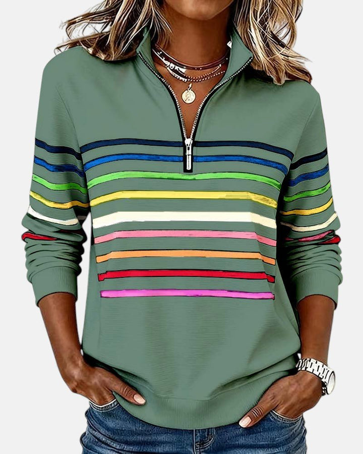 Women's relaxed fit cotton blend sweatshirt featuring a quarter zip design and vibrant rainbow stripes, perfect for casual outings and comfortable layering. 5