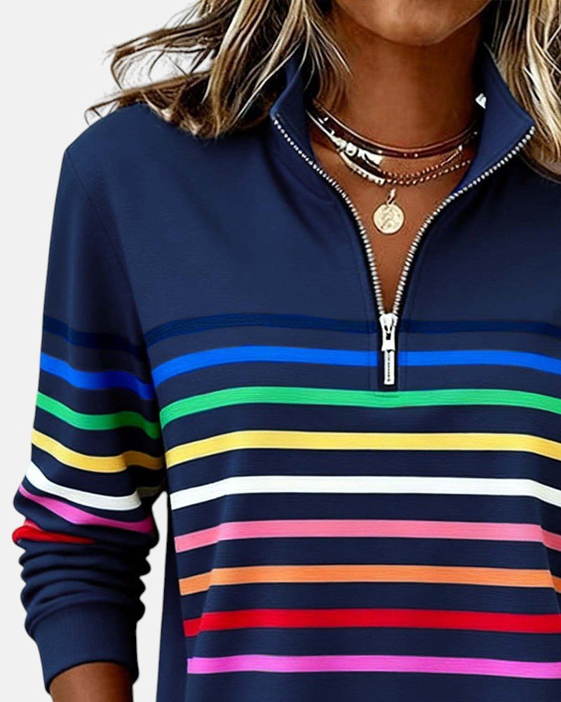 Women's relaxed fit cotton blend sweatshirt featuring a quarter zip design and vibrant rainbow stripes, perfect for casual outings and comfortable layering. 8